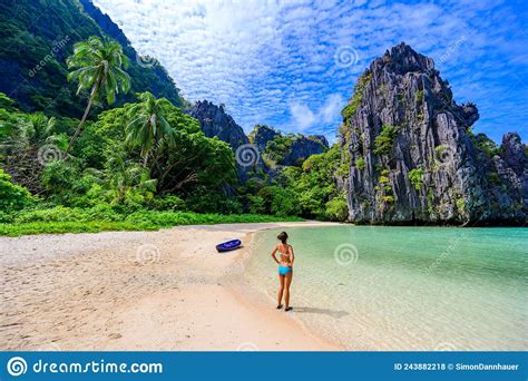 Girl At Hidden Beach In Matinloc Island El Nido Palawan Philippines