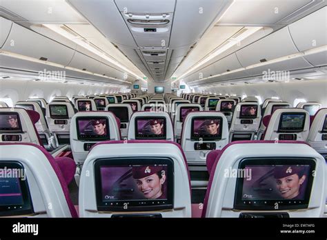 Interior View Of The Economy Class Section Of The Qatar Airways Airbus