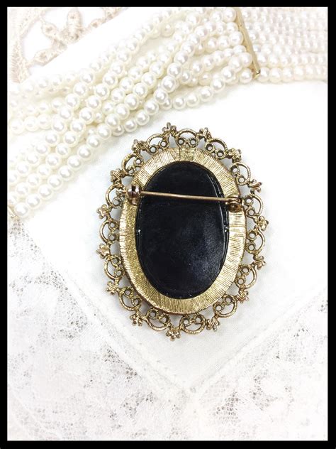 Stunning Black Cameo Broochpin With Gold Accents And Filigree Border