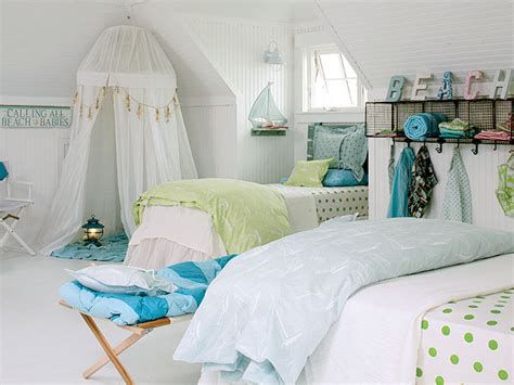 The white bedspread keeps things crisp, and the open iron headboard leaves the look airy and light. 26 Cute Beach Style Kid's Bedroom Design Ideas