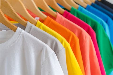 Premium Photo Close Up Of Colorful T Shirts On Hangers