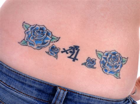 15 Beautiful Lower Back Tattoo Designs And Ideas 2022