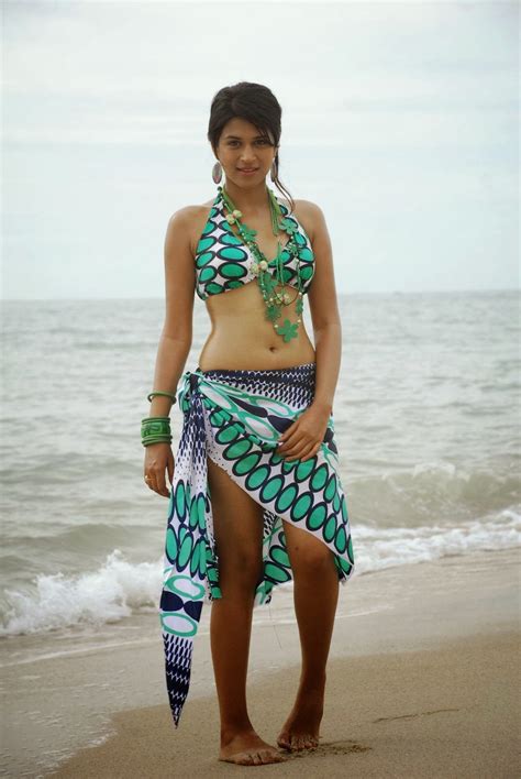 Fighting The Darkness Shraddha Das Showcasing Her Amazing Body In A Colorful Bikini In Telugu