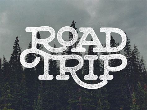 The Word Road Trip Written In White On A Background Of Trees
