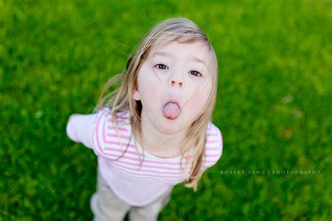Young Girl Standing On Grass Poking Tongue Out Australia Flickr