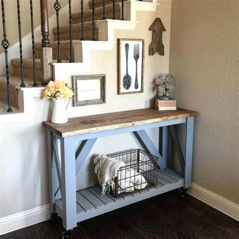 It has a semicircular table top and a small diy pallet potting and entry way table | pallet furniture diy. Few Entryway Table Décor Ideas Which You Can Do At Home