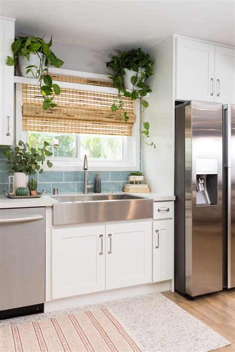 You can have stainless steel appliances or even black in a white kitchen, says alan zielinski, past president of the national kitchen and bath association and owner of better kitchens in niles, ill. Contemporary White Kitchen with Stainless Steel Farmhouse Sink | HGTV