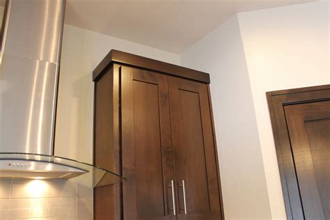 Empty space above cabinets is a common problem, because the distance fluctuates depending on ceiling height and cabinetry height. How to Choose Crown Molding for Cabinetry - Katie Jane ...