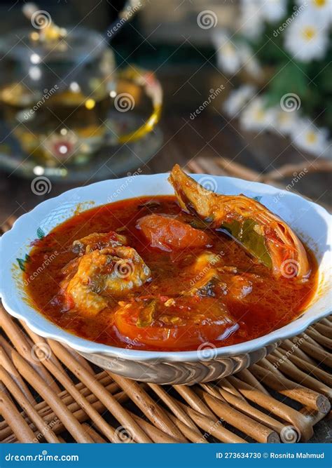 Malaysia Hot Spicy And Sour Fish Chicken Called Asam Pedas Stock Photo