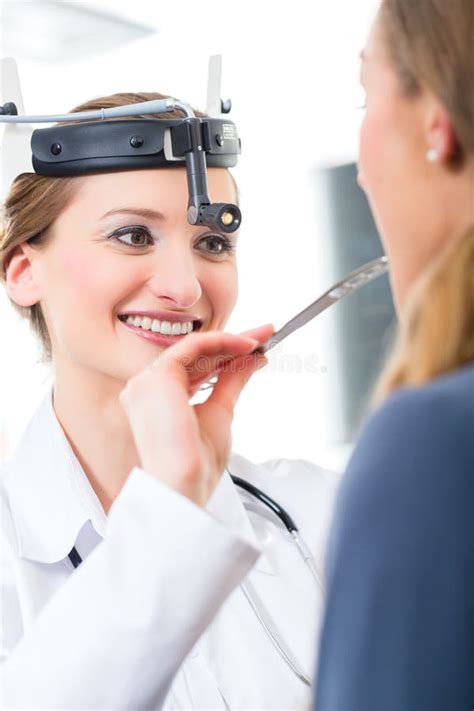 Patient In A Examination By Doctor In Clinic Stock Photo Image Of