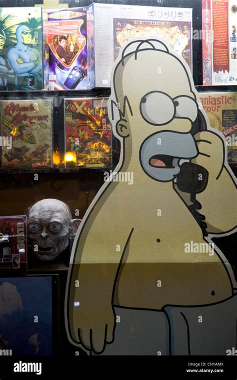 Figure Of Homer Simpson At A Shops Window Front Christchurch Stock