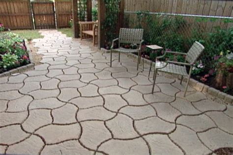 Building a paver or natural stone patio. How to Make a Patio from Concrete Pavers • DIY Projects ...