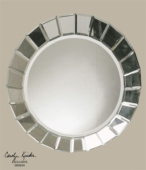 This Frameless Beveled Mirror Is Accented By Several Small