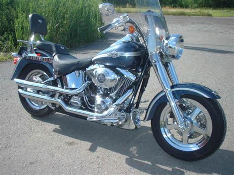 Front axle nut covers for harley dyna fatboy electra street glide road king chr. 2003 Harley-Davidson FLSTFI Fat Boy - Moto.ZombDrive.COM