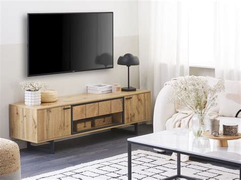tv möbel heller holzfarbton schwarz 160 x 40 x 50 cm boiso beliani de