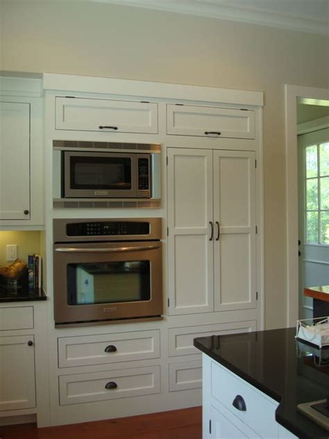 It is necessary that you just obtain a great contractor to put in the cabinets. cabinetry around microwave and oven | Wall oven kitchen ...