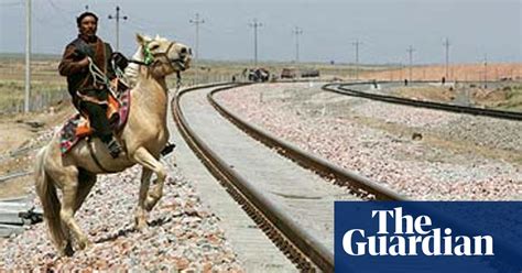 Protests As Tibet China Rail Link Opens World News The Guardian