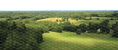 Aerial View Of A Landscape Of Meadows And Trees Vishopper