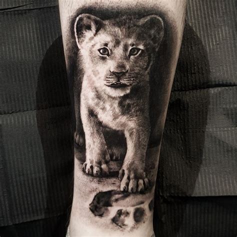 Lion Cub Paw Print Tattoo Pluggedinjunior