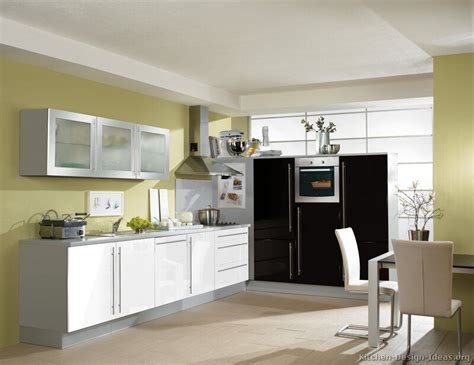 See more ideas about kitchen design, kitchen pictures, white kitchen. #Kitchen of the Day: A small modern kitchen with light green walls and black & white cabinets ...