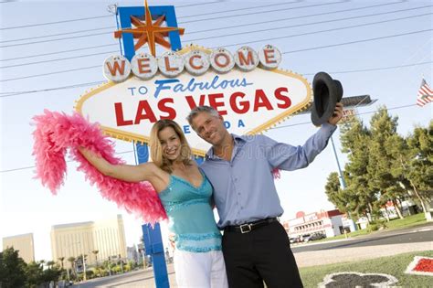 Las Vegas Tourist Couple At Las Vegas Sign Stock Photo Image Of