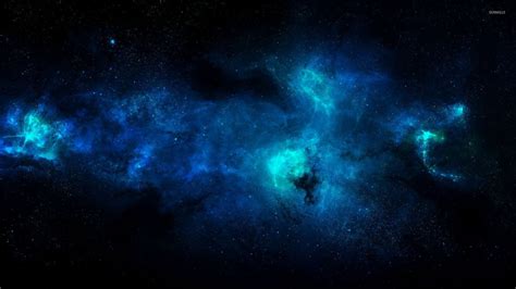 Blue Nebula Illuminating The Darkness Of The Space Wallpaper 