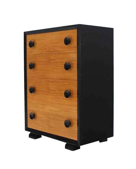 I wanted to paint the box of the dresser in a bright white gloss and stain the drawer fronts in a medium brown for a two tone look. Two-Tone Mid-Century Modern Four-Drawer Dresser For Sale ...