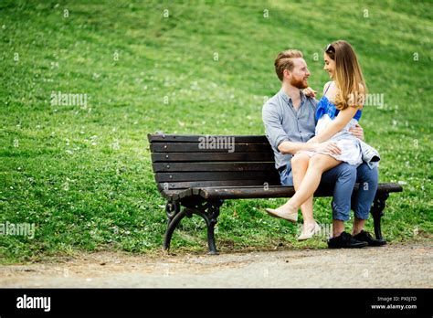 Romantic Couple In Park Stock Photo Alamy