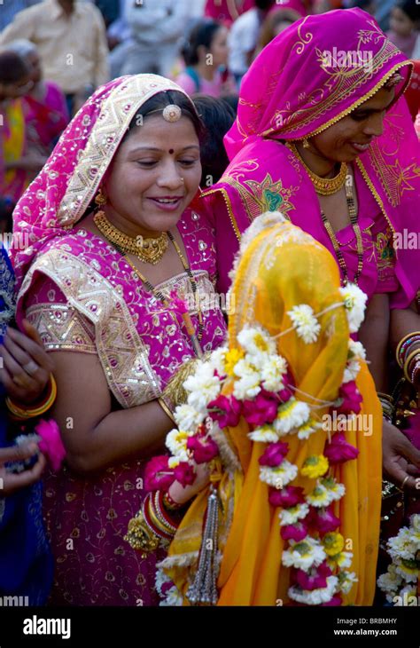 A Woman Dressed In A Colourful Sari At The Mewar Festival On Lake