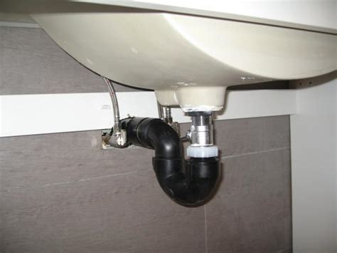 The name is derived from its shape—a looping configuration that looks like a sideways p. the bend in the trap holds a small amount of standing water that's left behind in the drain each time the sink is used. Bathroom Sink P-trap disassembly and installation ...