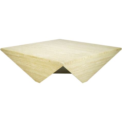 A glass table top supported by a meticulous framework of steel rods, the origami square coffee table presents a hypnotic fusion of geometry and design. Origami-Form Custom Travertine Marble Coffee Table at 1stdibs