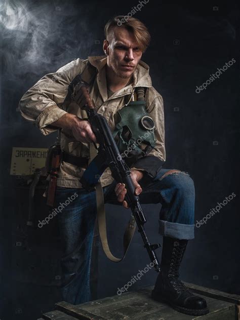 Armed Man With A Gun Stalker — Stock Photo © Fotoatelie 95368676