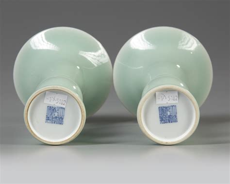 A Pair Of Chinese Celadon Glazed Gu Vases Oaa