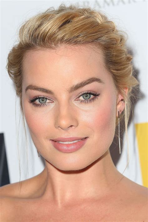 We D Love To Know The Secret To Margot S Perfect Complexion This Textured Updo Is Also Giving