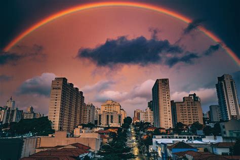 Amazing Rainbow Over City At Sunset · Free Stock Photo
