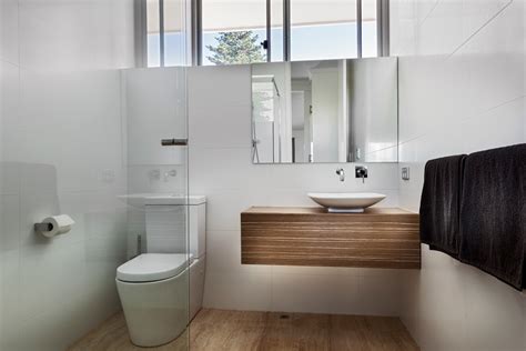 Perfect for smaller bathrooms that risk feeling a bit cramped. Pretty frameless mirrors in Contemporary Perth with ...
