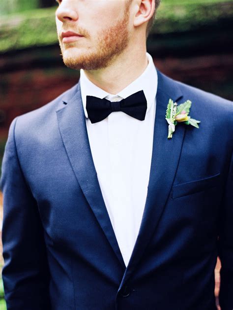 Groom In A Clic Navy Suit With Black Bow Tie Perry Vaile Black Tie