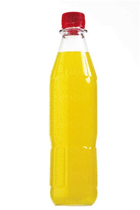 Bottle Of Yellow Liquid Stock Photo