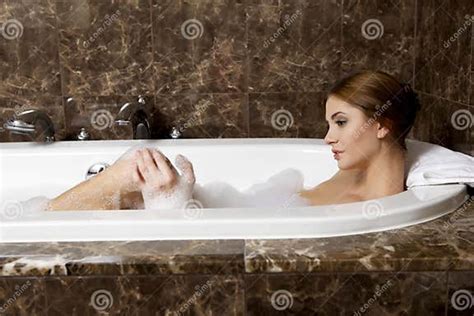 Woman In Bath Relaxing Closeup Of Young Woman In Bathtub Bathing Stock