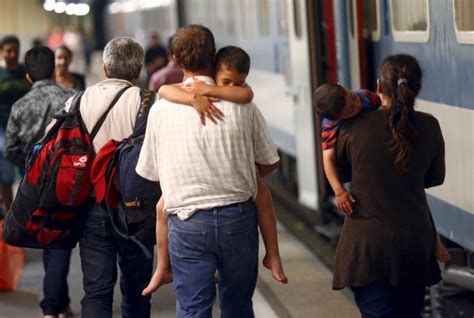 Eu Migrant Crisis Trains Carrying Hundreds Of Refugees Arrive In Germany And Austria