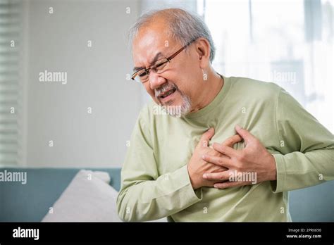 Senior Man Bad Pain Hand Touching Chest Having Heart Attack Asian