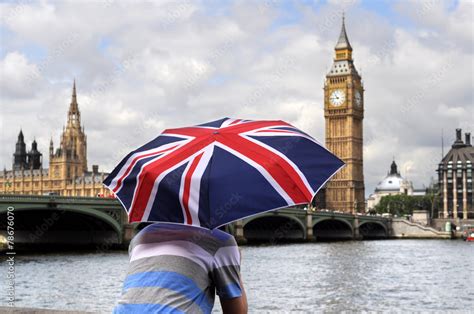 Big Ben And Tourist With British Flag Umbrella In London Stock Photo Adobe Stock