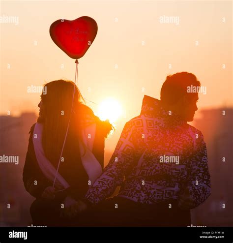 Young Couple In Love Balloon Heart Stock Photo Alamy
