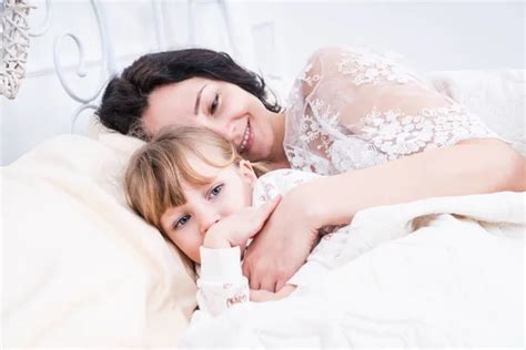 Mom With Her Daughter In Bed Stock Image Everypixel