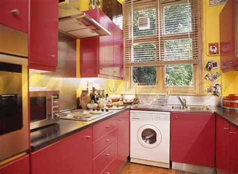 Timeless style, unbelievable prices, made to measure our beautiful wood impressions collection features faux wooden blinds with and without decorative. Image: Yellow kitchen with fitted red cupboards and ...