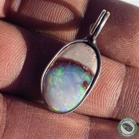 22 Mm Blue Green Ocean Scene Opal Pendant From Idaho