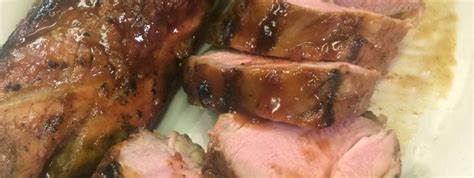 Herb and mustard brushed pork tenderloin wrapped with sweet and smoky bacon. Grilled BBQ Pork Tenderloin - Sparkle Markets Recipe Archive