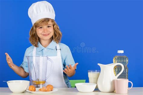 Child Chef Isolated On Blue Funny Little Kid Chef Cook Wearing Uniform