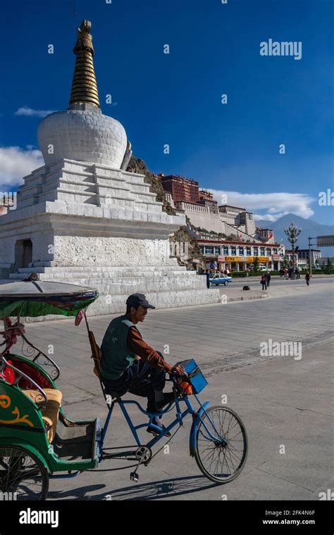 Buddhist Stupa Near The Potala Palace A Dzong Fortress In The City Of
