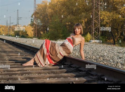 Beautiful Girl Sitting On Railroad Track Stock Photo Alamy